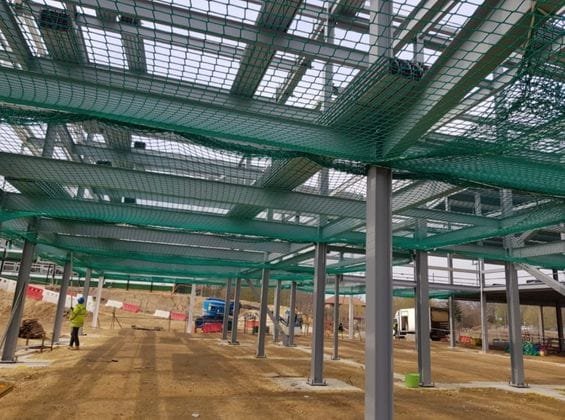 Warehouse bird net installation