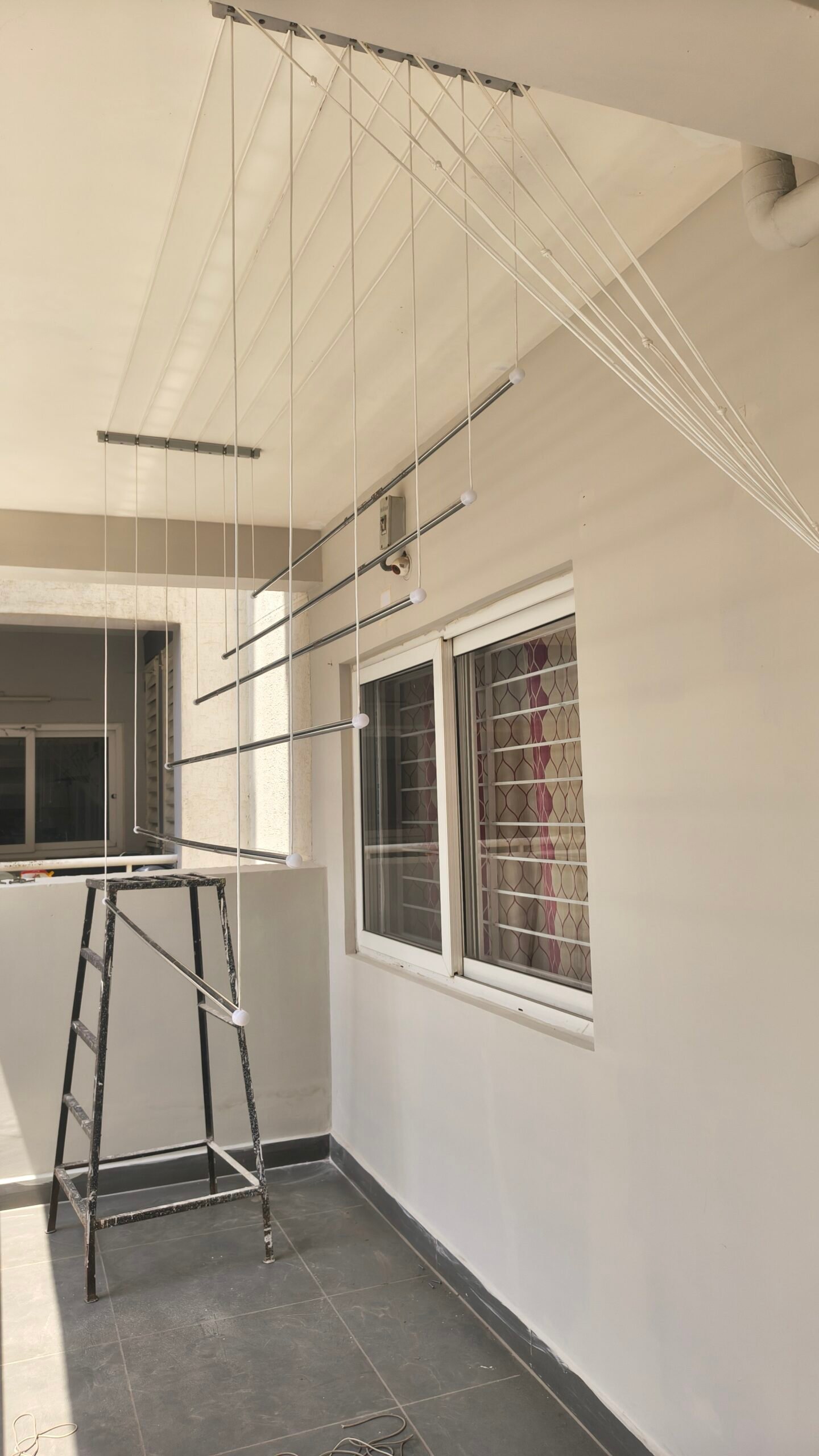 Multi rod cloth hanger installation
